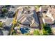 Beautiful aerial shot of home with solar panels, a private pool, lush landscaping, and spacious backyard patio at 20211 E Via Del Oro --, Queen Creek, AZ 85142