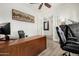 Office featuring a large desk, swivel chairs, and access to other parts of the home at 20211 E Via Del Oro --, Queen Creek, AZ 85142