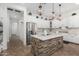 Modern kitchen with stainless steel appliances and custom cabinets at 20211 E Via Del Oro --, Queen Creek, AZ 85142