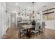 Bright kitchen with stainless steel appliances, granite countertops, and decorative lighting at 20211 E Via Del Oro --, Queen Creek, AZ 85142