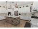Gourmet kitchen with large island, stainless appliances, and granite countertops at 20211 E Via Del Oro --, Queen Creek, AZ 85142