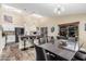 Open-concept living space features a modern kitchen, dining area, and sleek finishes at 2108 E Patrick Ln, Phoenix, AZ 85024