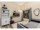 Media room featuring a daybed, TV, bookshelf, and a cozy rug at 2108 E Patrick Ln, Phoenix, AZ 85024