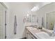 Bathroom showing dual sinks with vanity and an ample amount of counter space at 2120 N Heritage St, Buckeye, AZ 85396