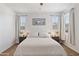 Inviting bedroom with a comfortable bed, bedside tables, and plenty of natural light at 2120 N Heritage St, Buckeye, AZ 85396