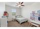 ' bedroom featuring a single bed, learning center, and ample natural light at 2120 N Heritage St, Buckeye, AZ 85396