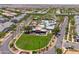 Aerial view of community center, pool, and green space, showcasing a vibrant neighborhood at 2120 N Heritage St, Buckeye, AZ 85396