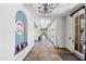 Bright hallway featuring tile flooring and neutral walls, leading to community center amenities at 2120 N Heritage St, Buckeye, AZ 85396
