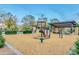 Community playground with slides, and picnic tables in a safe, enclosed, and landscaped area at 2120 N Heritage St, Buckeye, AZ 85396
