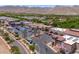 Aerial view of a shopping center with restaurants, stores, and other amenities, conveniently located at 2120 N Heritage St, Buckeye, AZ 85396