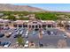 Neighborhood shopping center with spacious parking, pedestrian-friendly sidewalks, and well-designed buildings at 2120 N Heritage St, Buckeye, AZ 85396
