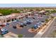 Retail center featuring spacious parking, sidewalks, and charming architecture in a suburban area at 2120 N Heritage St, Buckeye, AZ 85396