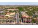 Charming street lined with shops and palm trees; features inviting sidewalks and beautiful architecture at 2120 N Heritage St, Buckeye, AZ 85396