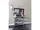 Entryway boasts modern table and decorations, stylish lighting, with a decorative mirror at 2339 E Evans Dr, Phoenix, AZ 85022