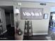 Living room view showcasing tasteful decor, including art and decorative shelving at 2339 E Evans Dr, Phoenix, AZ 85022