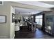 Cozy living space with an open floor plan that leads to a dining area and kitchen at 2339 E Evans Dr, Phoenix, AZ 85022