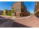Street view of modern two-story townhomes with attached garages and neat landscaping at 240 W Juniper Ave # 1211, Gilbert, AZ 85233