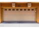 Garage door with small windows along the top and address number 1211 above the door at 240 W Juniper Ave # 1211, Gilbert, AZ 85233
