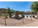 Community pool area with shaded grilling area and well-maintained landscaping throughout the property at 240 W Juniper Ave # 1211, Gilbert, AZ 85233