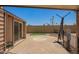Backyard featuring decorative gravel, artificial grass, and a privacy wall at 2529 N Barber Dr, Mesa, AZ 85215