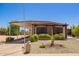Single-story home with desert landscaping and a covered parking area at 2529 N Barber Dr, Mesa, AZ 85215