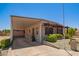 Single-story home featuring a covered parking area and desert landscaping at 2529 N Barber Dr, Mesa, AZ 85215