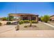 Charming home featuring desert landscaping, a covered carport, and a unique architectural style at 2529 N Barber Dr, Mesa, AZ 85215