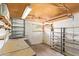 A spacious garage area with shelving units and natural light at 2529 N Barber Dr, Mesa, AZ 85215