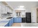 Bright kitchen features two-tone cabinets, modern appliances, and a stylish backsplash at 2529 N Barber Dr, Mesa, AZ 85215