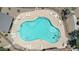 Aerial view of a community pool with lounge chairs for relaxing at 2790 S Alpine Dr, Gilbert, AZ 85295