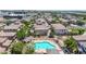 An aerial view of a community pool and homes, offering a serene retreat at 2790 S Alpine Dr, Gilbert, AZ 85295