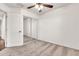 Well-lit bedroom with soft carpet and mirrored closet at 2790 S Alpine Dr, Gilbert, AZ 85295