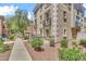 Elegant multi-story townhome with wrought iron balconies and desert landscaping at 2790 S Alpine Dr, Gilbert, AZ 85295