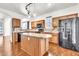 Well-equipped kitchen with a granite island and modern stainless steel appliances at 2790 S Alpine Dr, Gilbert, AZ 85295