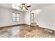 Bright living room with natural light, staircase, and stylish multi-tone tile flooring at 2790 S Alpine Dr, Gilbert, AZ 85295