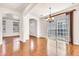 Spacious living room with wood floors, archways, and natural light at 2790 S Alpine Dr, Gilbert, AZ 85295