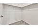 Spacious walk-in closet with carpet flooring and plenty of storage space at 2790 S Alpine Dr, Gilbert, AZ 85295