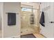 The bathroom features a glass shower with tile and a convenient built-in bench at 28798 N 127Th Ave, Peoria, AZ 85383