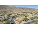 Breathtaking aerial shot of a residential area with mountain views featuring lush green lawns and single Gathering homes at 3441 E Melody Dr, Phoenix, AZ 85042