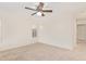 Spacious bedroom offers neutral carpet and windows with plantation shutters at 3441 E Melody Dr, Phoenix, AZ 85042