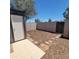 A fenced backyard includes a storage shed and stone pavers at 3645 N 69Th Ave # 99, Phoenix, AZ 85033