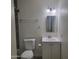 Cozy bathroom featuring a toilet, vanity with sink, and updated fixtures at 3645 N 69Th Ave # 99, Phoenix, AZ 85033
