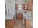 The kitchen features a modern design with stylish countertops and ample cabinet space at 3645 N 69Th Ave # 99, Phoenix, AZ 85033