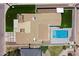Top-down view of a property highlighting the roof, pool, and surrounding landscape within a fenced perimeter at 4202 E Catalina Dr, Phoenix, AZ 85018