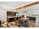 Bright kitchen with a large central island, modern appliances, and an open layout leading to the living room at 4202 E Catalina Dr, Phoenix, AZ 85018