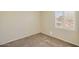 Cozy carpeted bedroom with window shutters, neutral walls, and ample natural light at 4327 E Desert Sky Ct, Cave Creek, AZ 85331