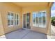 Covered patio featuring ample windows, sliding door, and concrete flooring at 4327 E Desert Sky Ct, Cave Creek, AZ 85331