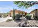 Charming home with desert landscaping, a two-car garage, and a welcoming entrance at 4327 E Desert Sky Ct, Cave Creek, AZ 85331