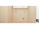 Functional laundry room with storage cabinets and washer/dryer hookups at 4327 E Desert Sky Ct, Cave Creek, AZ 85331