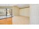 Bright living area adjacent to the kitchen with hardwood floors and ample space at 4327 E Desert Sky Ct, Cave Creek, AZ 85331